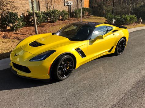C7 for sale - Mileage: 12,002 miles MPG: 16 city / 27 hwy Color: Black Body Style: Coupe Engine: 8 Cyl 6.2 L Transmission: Automatic. Description: Used 2014 Chevrolet Corvette Z51 with Rear-Wheel Drive, Paddle Shifter, 20 Inch Wheels, Cooled Seats, Alloy Wheels, Navigation System, Remote Start, Keyless Entry, Leather Seats, Spoiler, and Heated Seats. 